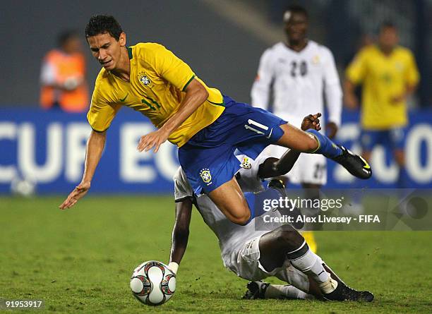 Paulo Henrique of Brazil is fouled by Mohammed Rabiu of Ghana during the FIFA U20 World Cup Final between Ghana and Brazil at the Cairo International...