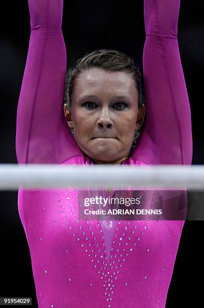 Gymnast Bridget Sloan performs in the uneven bars event in the women's individual all-around final during the Artistic Gymnastics World Championships...