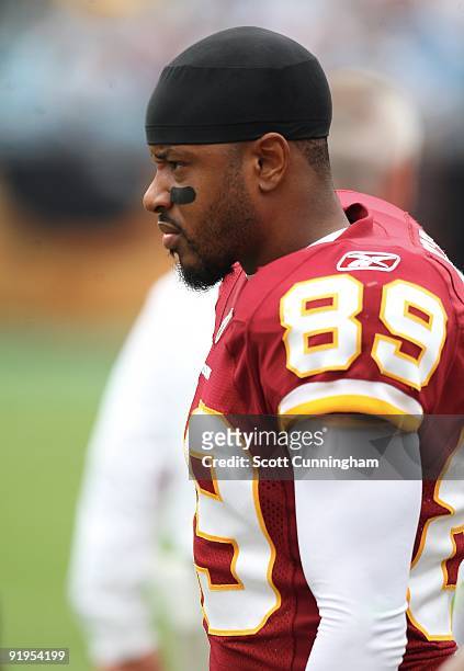 Santana Moss of the Washington Redskins watches the action against the Carolina Panthers at Bank of America Stadium on October 11, 2009 in Charlotte,...
