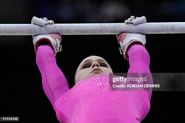 Gymnast Rebecca Bross performs in the uneven bars event in the women's individual all-around final during the Artistic Gymnastics World Championships...