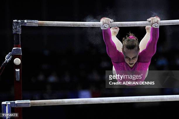 Gymnast Rebecca Bross performs in the uneven bars event in the women's individual all-around final during the Artistic Gymnastics World Championships...