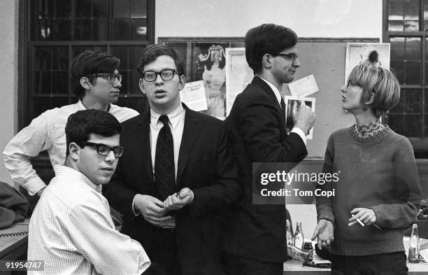 Staff members of the Michigan Daily at the University of Michigan, left to right Harvey Wasserman, unidentified, Bruce Wasserstein , Mark...