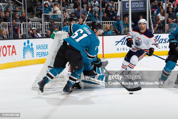 Justin Braun of the San Jose Sharks controls the puck against the Edmonton Oilers at SAP Center on February 10, 2018 in San Jose, California.