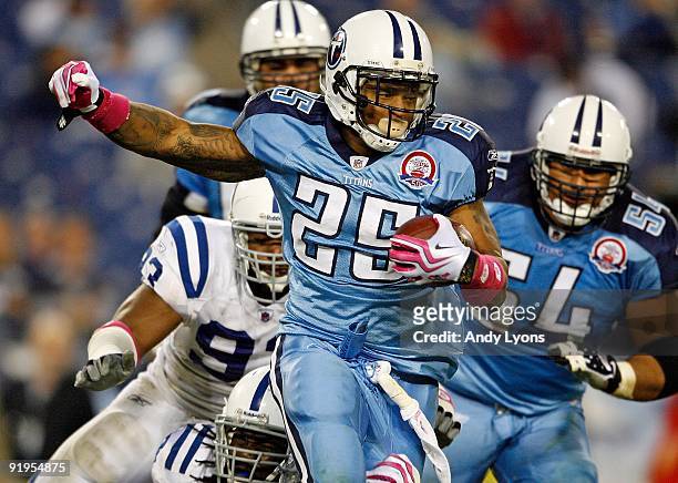LenDale White of the Tennessee Titans runs with the ball during the NFL game against the Indianapolis Colts at LP Field on October 11, 2009 in...
