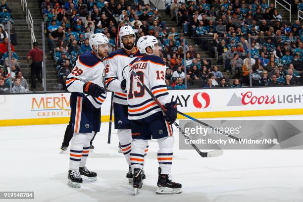 Leon Draisaitl of the Edmonton Oilers celebrates with teammates after scoring a goal against the San Jose Sharks at SAP Center on February 10, 2018...