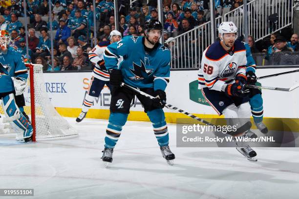 Marc-Edouard Vlasic of the San Jose Sharks skates against Anton Slepyshev of the Edmonton Oilers at SAP Center on February 10, 2018 in San Jose,...