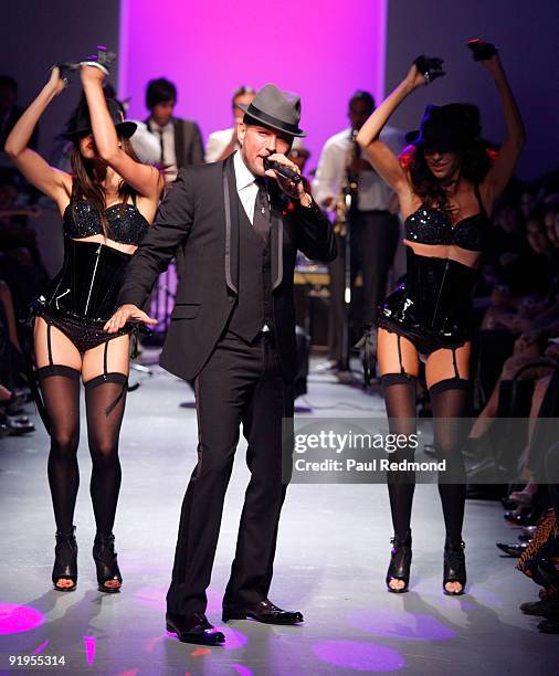 Singer Matt Goss performs with members of The Pussycat Dolls at the Downtown LA Fashion Week Spring 2010 - Vintage Valentino at The Geffen...