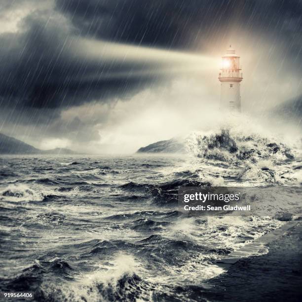 lighthouse beacon - storm lighthouse stock pictures, royalty-free photos & images