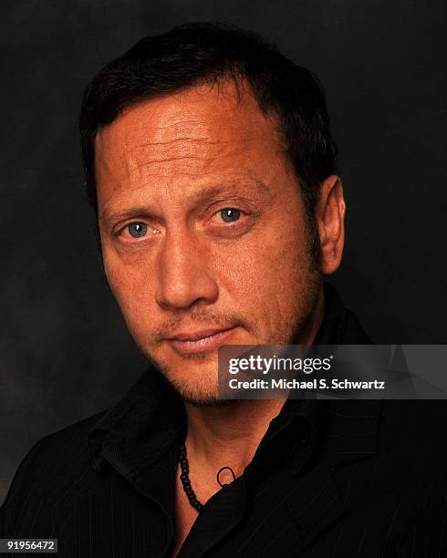 Comedian Rob Schneider poses at The Ice House Comedy Club on October 15, 2009 in Pasadena, California.