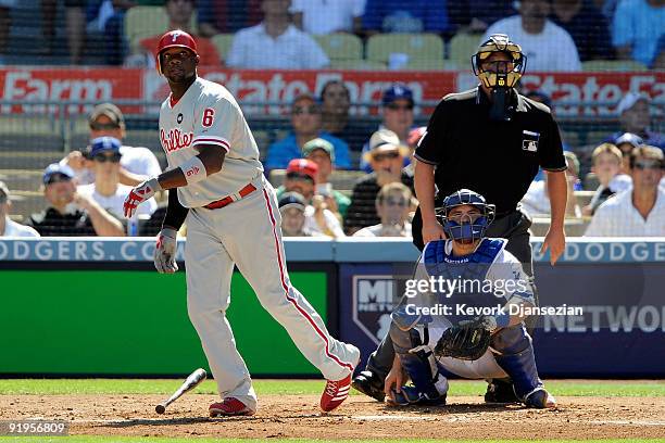 Ryan Howard of the Philadelphia Phillies hits a solo home run in the fourth inning off of pitcher Vicente Padilla of the Los Angeles Dodgers in Game...