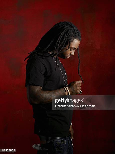 Rapper Lil' Wayne poses at a portrait session for Vibe Magazine in 2007.