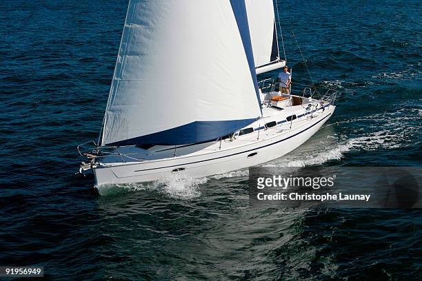 aerial view of a sailing yacht cruising in pittwater on the north shore from sydney, australia. - pittwater stock pictures, royalty-free photos & images