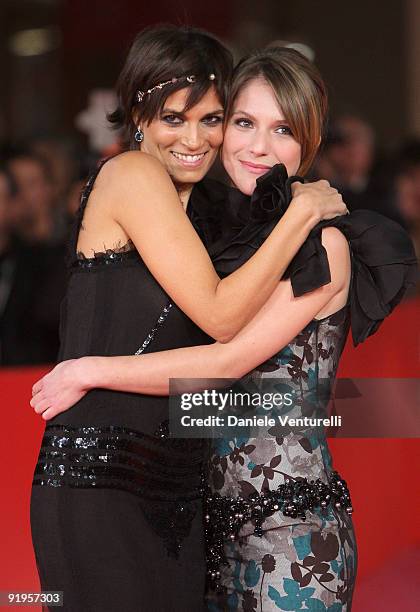 Actress Valeria Solarino kisses actress Isabella Ragonese as they attend the "Viola Di Mare" Premiere during day 2 of the 4th Rome International Film...