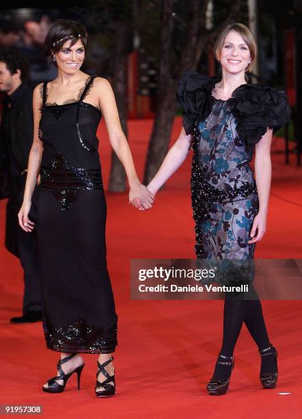 Actress Valeria Solarino kisses actress Isabella Ragonese as they attend the "Viola Di Mare" Premiere during day 2 of the 4th Rome International Film...