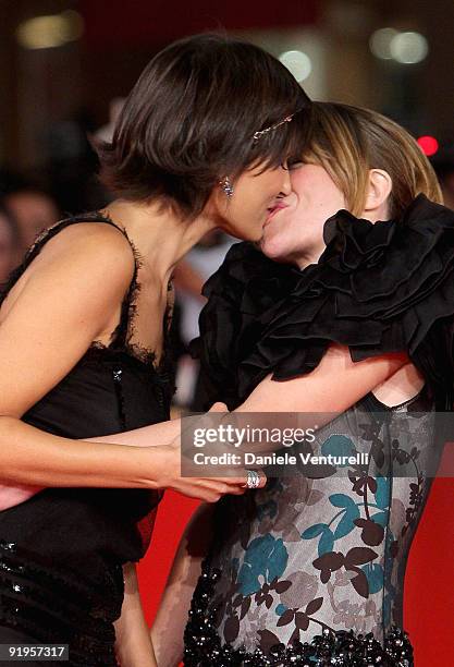 Actress Valeria Solarino kisses actress Isabella Ragonese as they attend the "Viola Di Mare" Premiere during day 2 of the 4th Rome International Film...