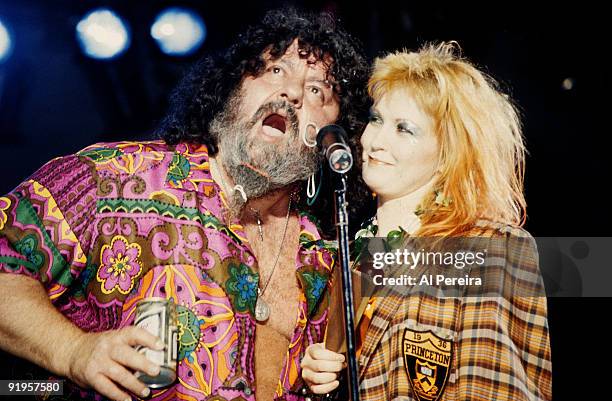 Professional Wrestler Captain Lou Albano has a beer and a few words from the stage with Cyndi Lauper when he attends Cyndi Lauper's performance at...