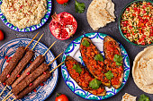Classic kebabs, tabbouleh salad, baba ganush and baked eggplant with sauce.