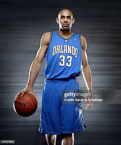 Basketball player Grant Hill poses at a portrait session in 2005.