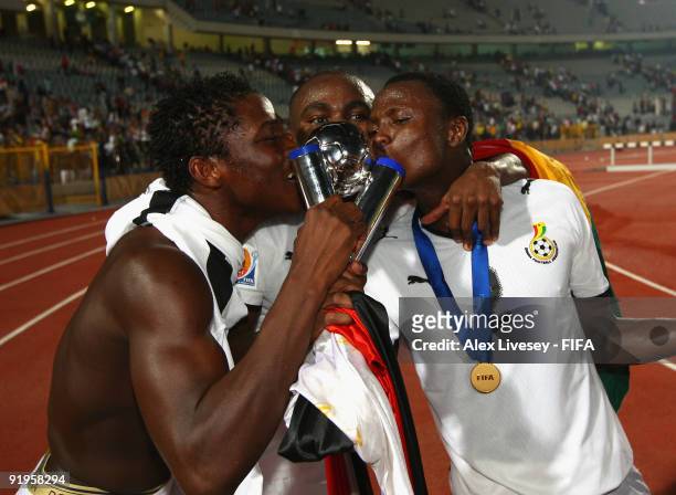 Opoku Agyemang, Daniel Opare and Samuel Inkoom of Ghana celebrate with the FIFA U20 World Cup after victory over Brazil in the FIFA U20 World Cup...