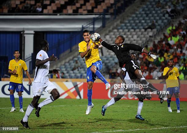 Ghana goalkeeper Daniel Agyei beats Maicon of Brazil to the ball during the FIFA U20 World Final match between Ghana and Brazil at the Cairo...