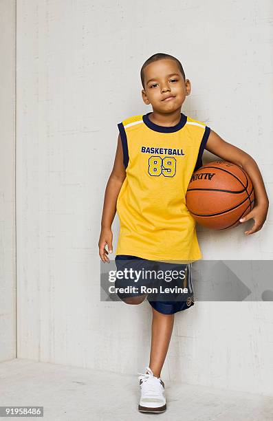 six year old boy holding basketball, portrait - smirking stock pictures, royalty-free photos & images