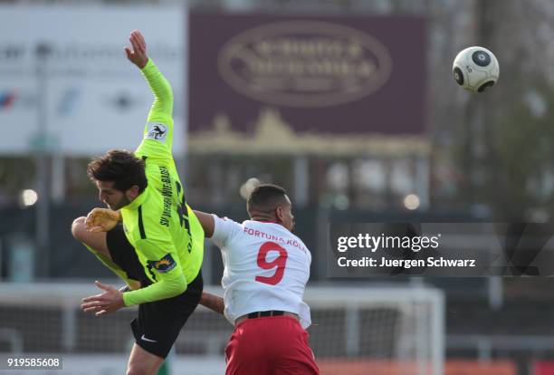 Niklas Dams of Wiesbaden and Daniel Keita-Ruel of Cologne fight for the ball during the 3. Liga match between SC Fortuna Koeln and SV Wehen Wiesbaden...