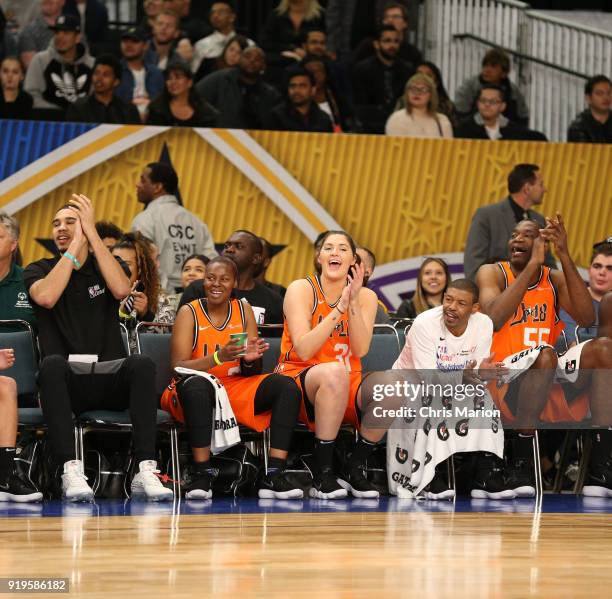 Jayson Tatum of the Boston Celtics, Stefanie Dolson of the Chicago Sky and former NBA player Dikembe Mutombo cheer during the 2018 NBA Cares Unified...