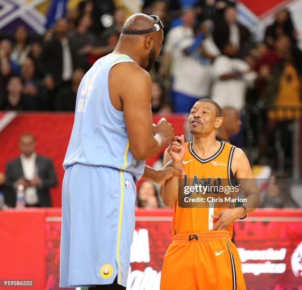 Former NBA players Muggsy Bogues and Horace Grant greet each other during the 2018 NBA Cares Unified Basketball Game as part of 2018 NBA All-Star...