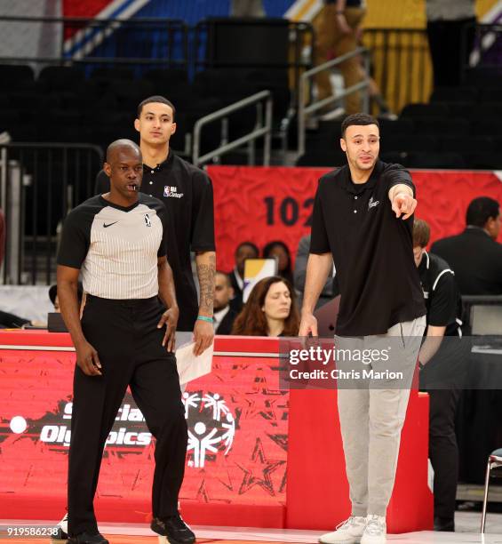 Larry Nance Jr. Of the Cleveland Cavaliers and Kyle Kuzma of the Los Angeles Lakers look on during the 2018 NBA Cares Unified Basketball Game as part...