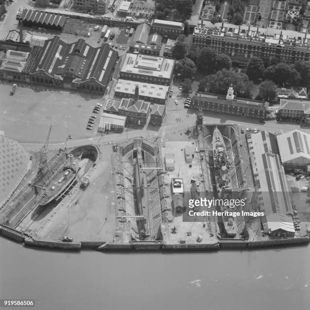 Chatham Historic Dockyard, Kent, 2001. This aerial photograph shows the dry docks at Chatham Dockyard beside the River Thames. The site was first...