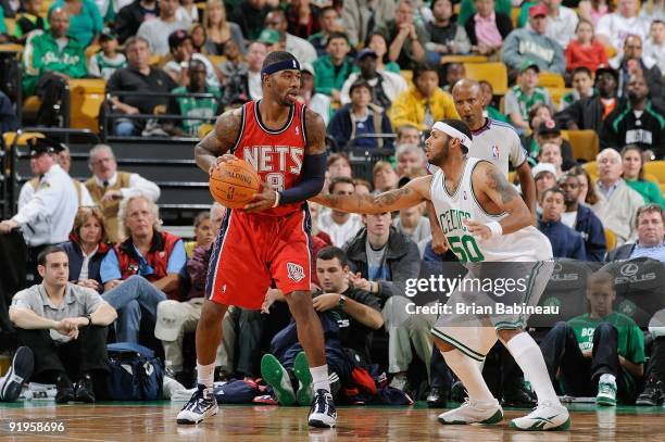 Terrence Williams of the New Jersey Nets drives the ball against Eddie House of the Boston Celtics during the game on October 11, 2009 at TD...