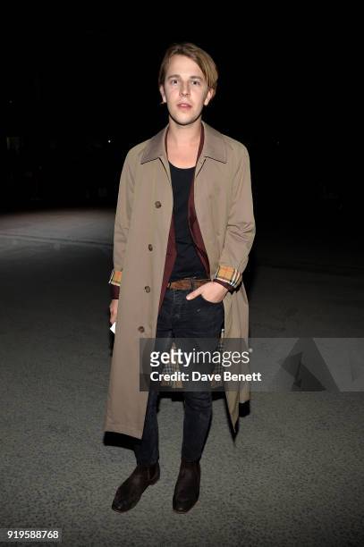Tom Odell wearing Burberry at the Burberry February 2018 show during London Fashion Week at Dimco Buildings on February 17, 2018 in London, England.