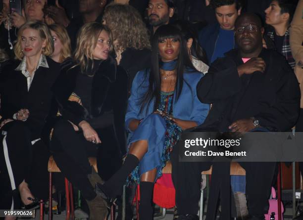 Naomi Watts, Kate Moss, Naomi Campbell and Steve McQueen wearing Burberry at the Burberry February 2018 show during London Fashion Week at Dimco...