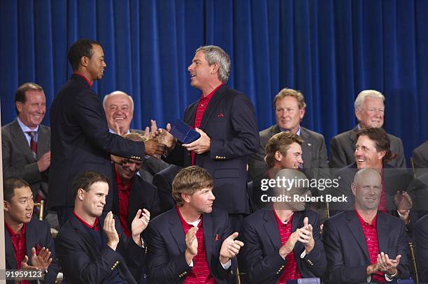 Captain Fred Couples handing medal to USA Tiger Woods during closing ceremony trophy presentation after winning tournament at Harding Park GC. San...