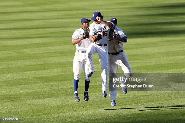 Andre Ethier, Juan Pierre and Matt Kemp of the Los Angeles Dodgers celebrate after defeating the Philadelphia Phillies 2-1 in Game Two of the NLCS...