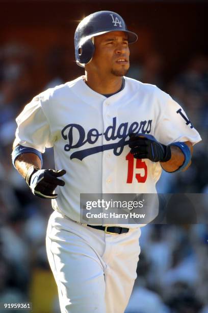 Rafael Furcal of the Los Angeles Dodgers takes a walk to first base in the eighth inning against the Philadelphia Phillies in Game Two of the NLCS...