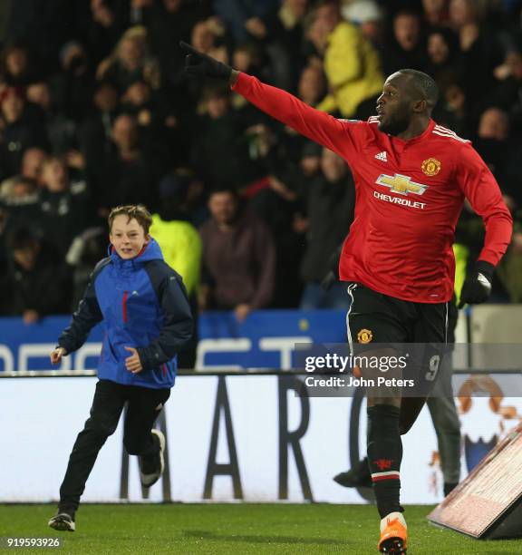 Romelu Lukaku of Manchester United celebrates scoring their second goal during the Emirates FA Cup Fifth Round match between Huddersfield Town and...