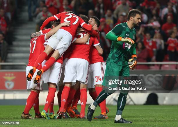 Benfica defender Ruben Dias from Portugal celebrates with teammates after scoring a goal during the Primeira Liga match between SL Benfica and...