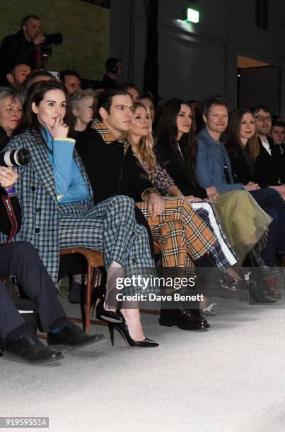 Michelle Dockery, James Righton, Keira Knightley, Simon Woods, Chelsea Clinton and Marc Mezvinsky wearing Burberry at the Burberry February 2018 show...