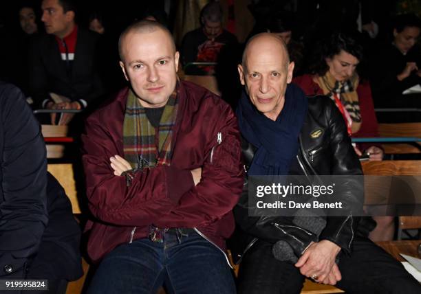 Gosha Rubchinskiy and Adrian Joffe wearing Burberry at the Burberry February 2018 show during London Fashion Week at Dimco Buildings on February 17,...