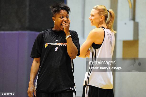 Cappie Pondexter and Penny Taylor of the Phoenix Mercury laugh during practice in preparation for Game Two of the WNBA Finals against the Indiana...