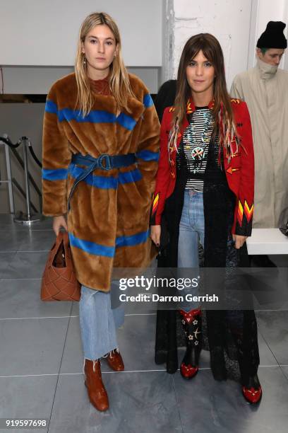 Camille Charriere and guest attend the Molly Goddard show during London Fashion Week February 2018 at TopShop Show Space on February 17, 2018 in...