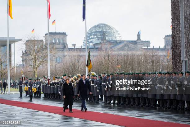 German Chancellor Angela Merkel welcomes Polish Prime Minister Mateusz Morawiecki with military honours in front of the Federal Chancellery in...