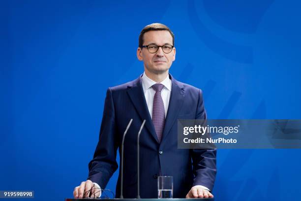 Polish Prime Minister Mateusz Morawiecki during a news conference with German Chancellor Angela Merkel following their meeting in Federal Chancellery...