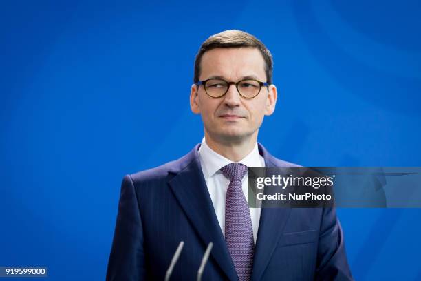 Polish Prime Minister Mateusz Morawiecki during a news conference with German Chancellor Angela Merkel following their meeting in Federal Chancellery...