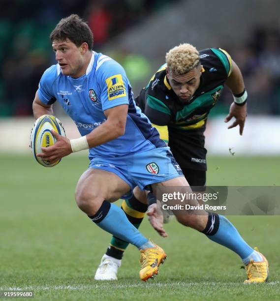 Piet van Zyl of London Irish moves away from Luther Burrell during the Aviva Premiership match between Northampton Saints and London Irish at...