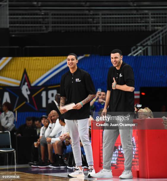 Larry Nance Jr. Of the Cleveland Cavaliers and Kyle Kuzma of the Los Angeles Lakers look on during the 2018 NBA Cares Unified Basketball Game as part...