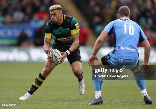Luther Burrell of Northampton takes on Greig Tonks during the Aviva Premiership match between Northampton Saints and London Irish at Franklin's...