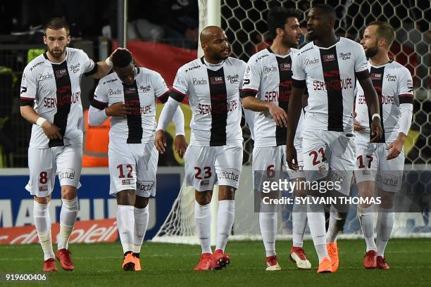 Guingamp's forward Yeni Atito Ngbakoto celebrates with his teammates after scoring a goal during the French L1 football match between Montpellier and...