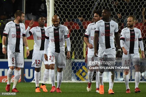 Guingamp's forward Yeni Atito Ngbakoto celebrates with his teammates after scoring a goal during the French L1 football match between Montpellier and...
